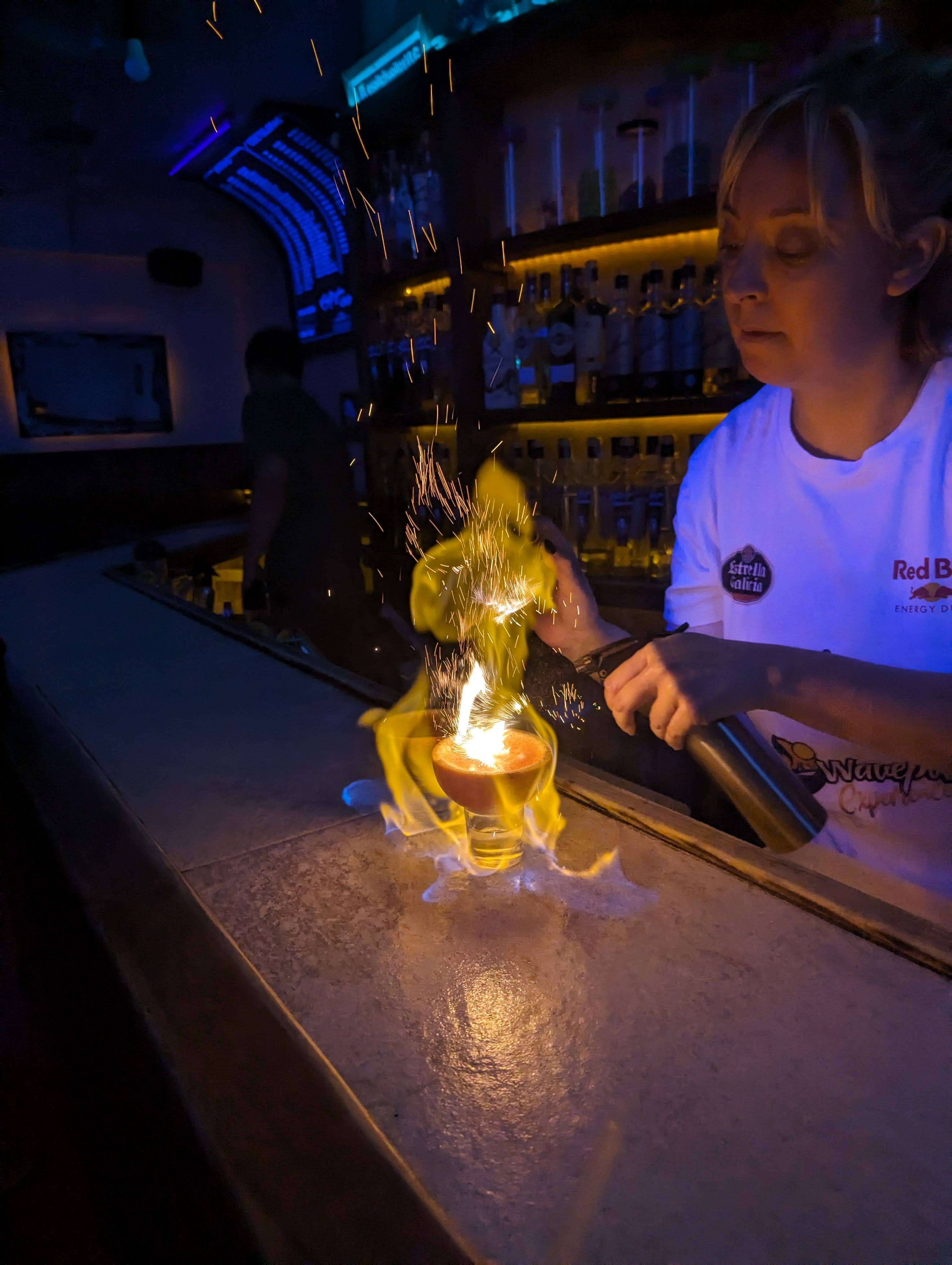 Shots covered in orange and blue fire at Espit Chupitos.