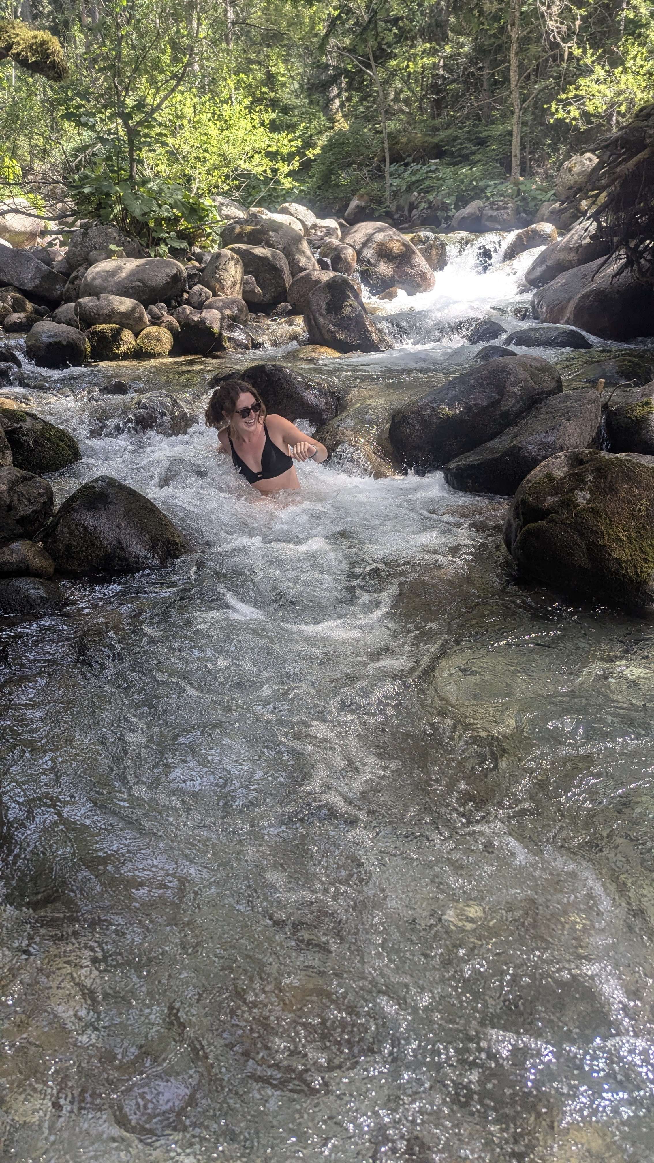 Me (Traveler Liz) sitting in a cold plunge pool in Bansko, Bulgaria