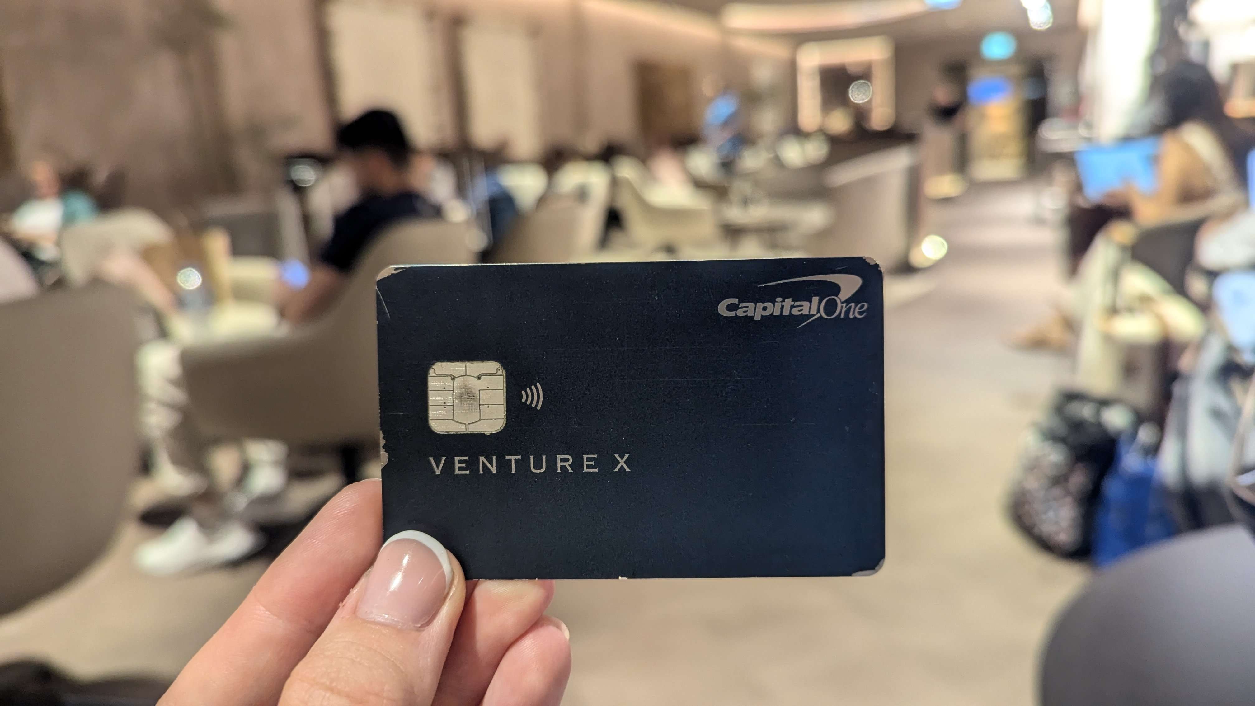 My Capital One Venture X card in the airport lounge.