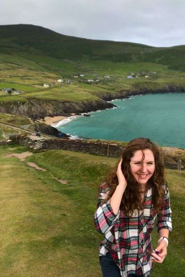 Liz walking up a cliff in Ireland before she got citizenship