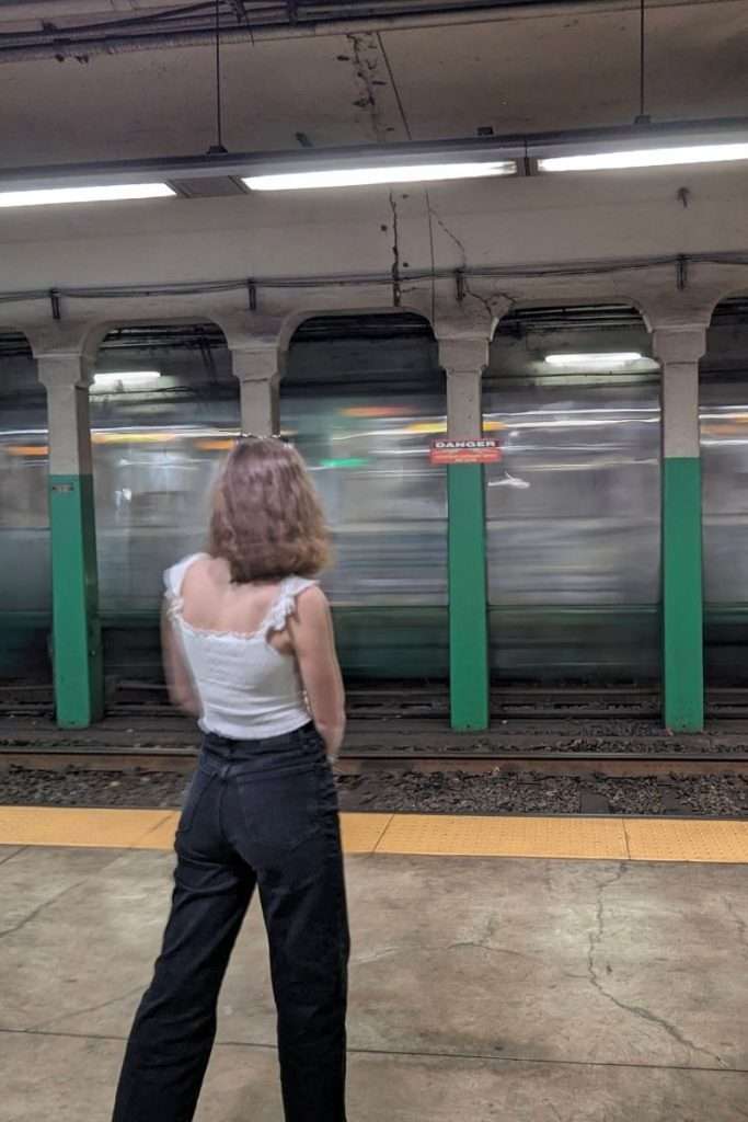 Traveler Liz waiting for the train in Boston.