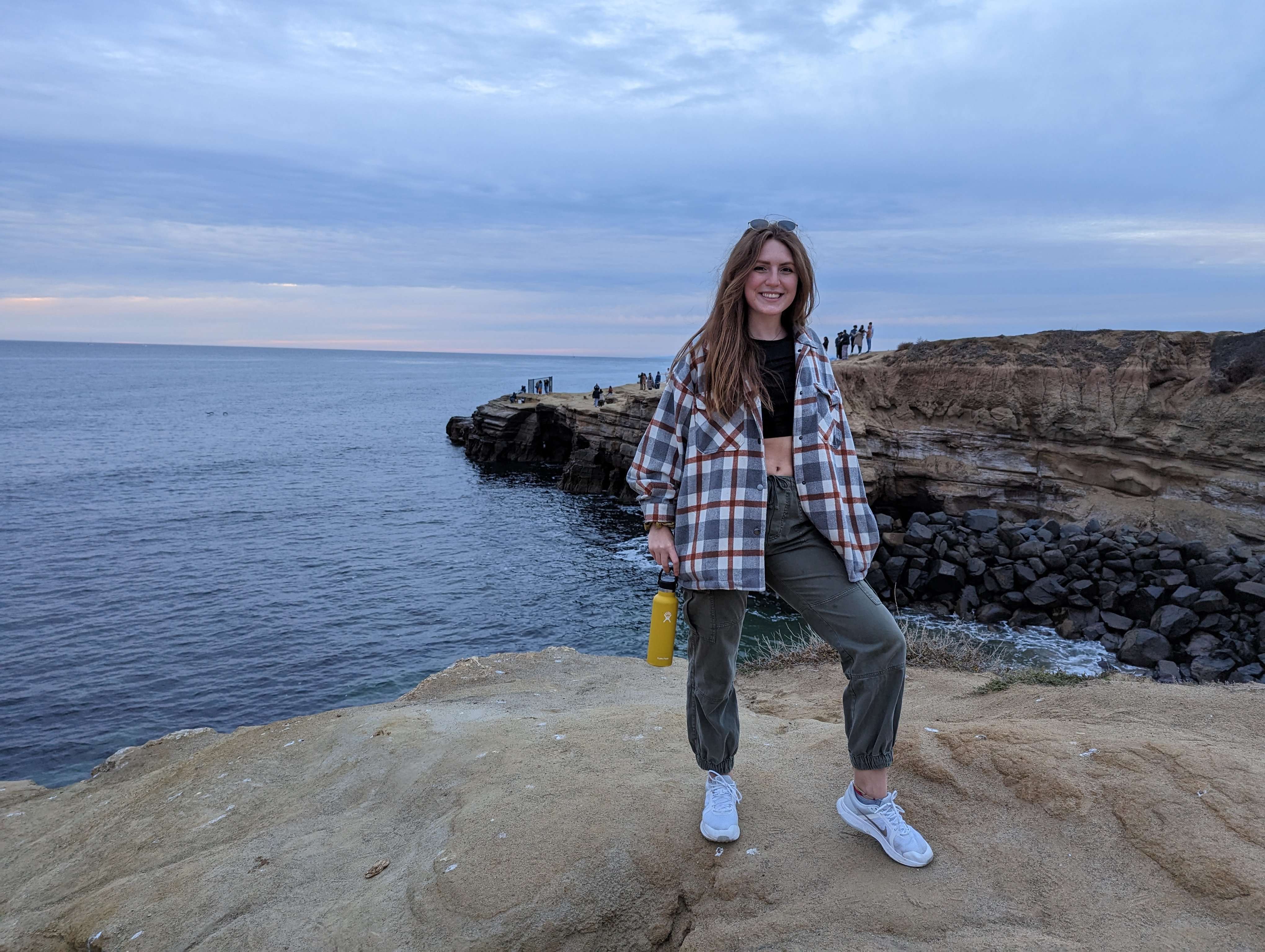 Traveler Liz in front of the Sunset Cliffs