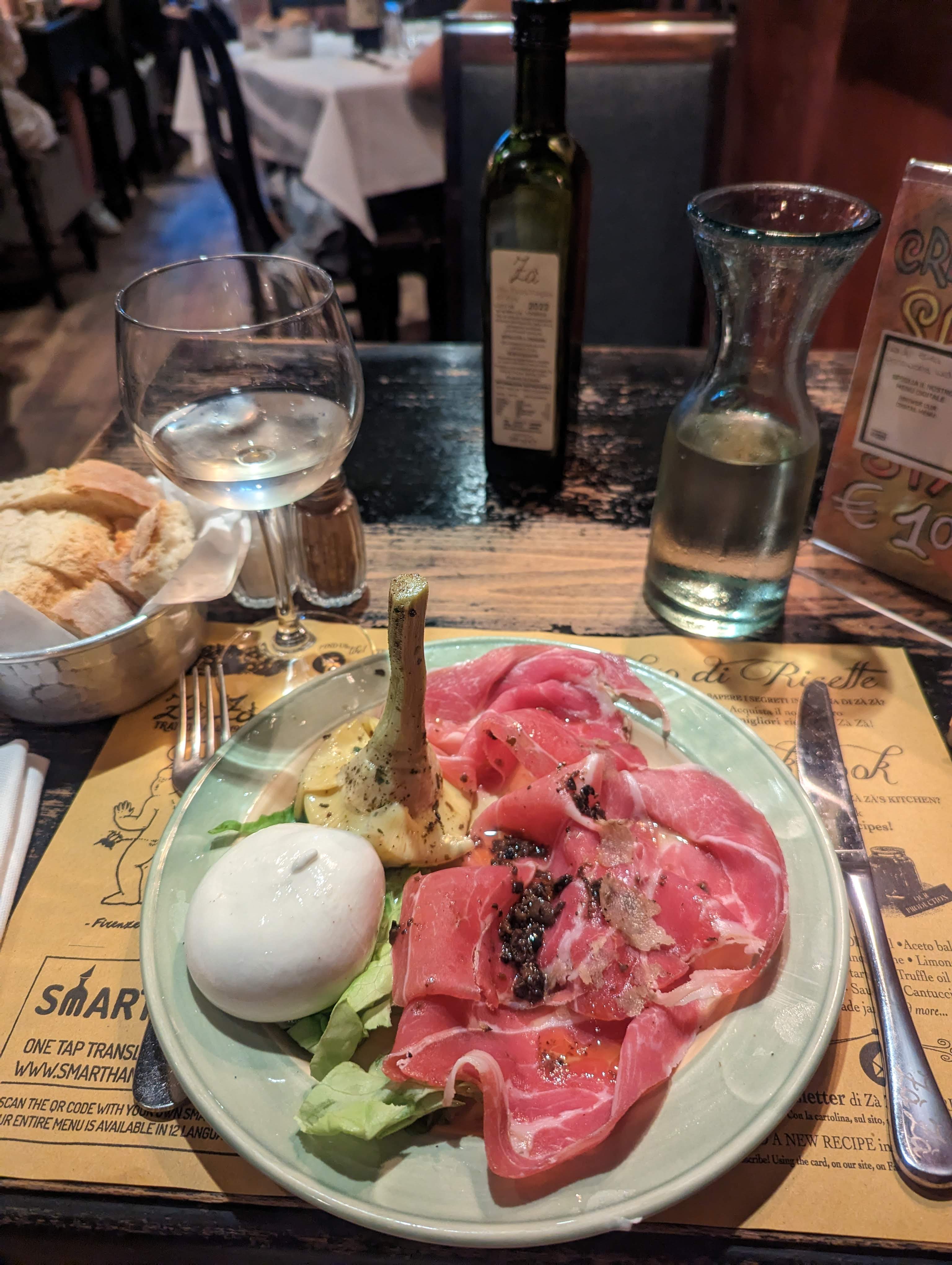 Proscuitto cheese truffle plate at a Trattoria Za Za in Florence.
