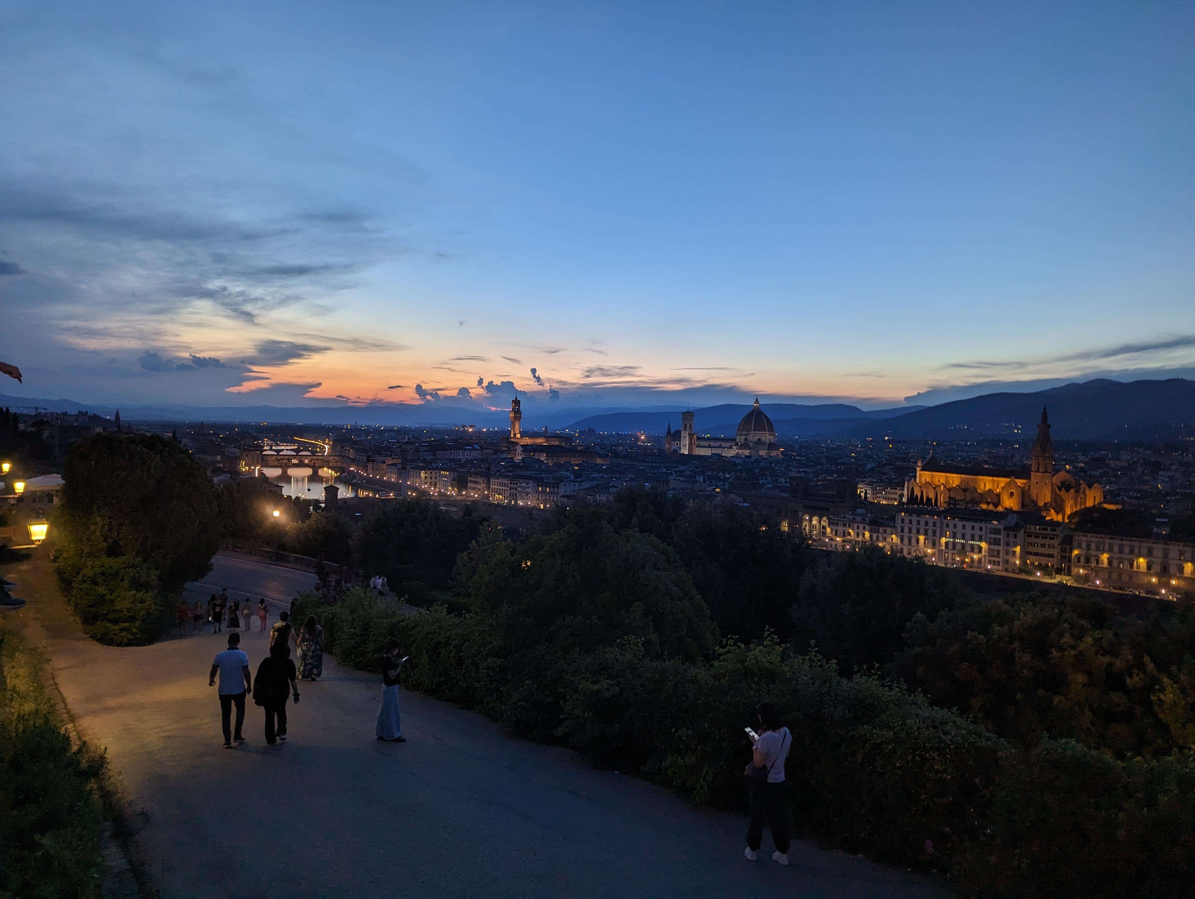 The sun setting over Piazzale Michelangelo in Florence.
