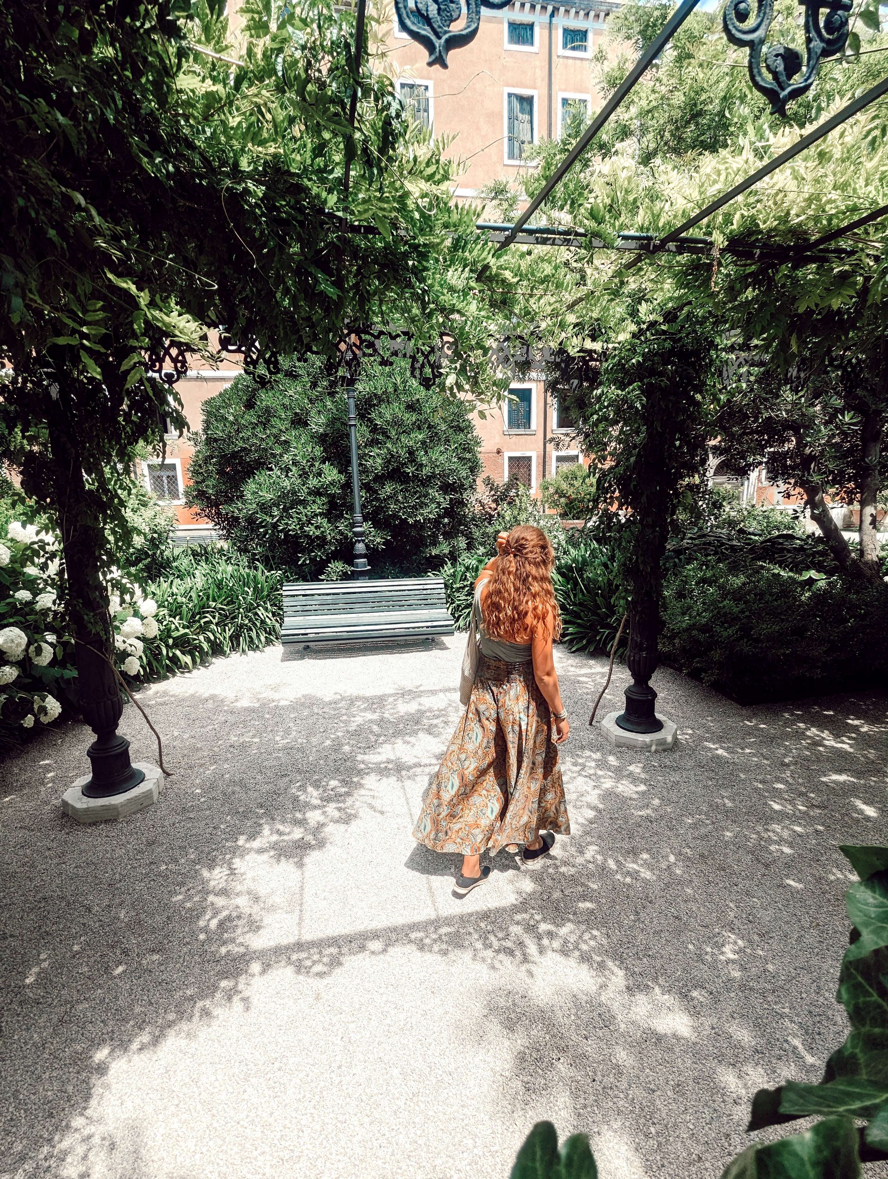 Me (Traveler Liz) walking down Giardini Real.