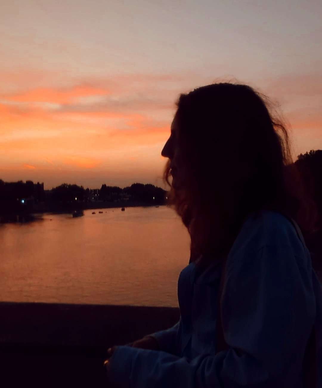 My (Traveler Liz) silhouette with the sun setting behind me