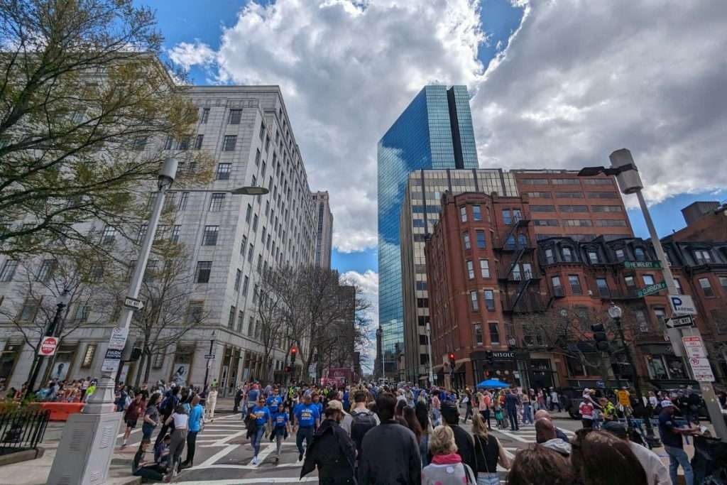 Boston Back Bay view with lots of runners after the Boston Marathon