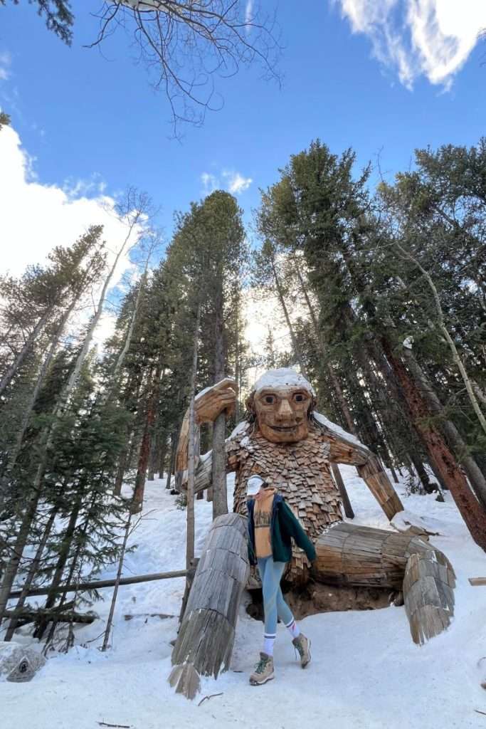 Traveler Liz in front of the Breckenridge Troll
