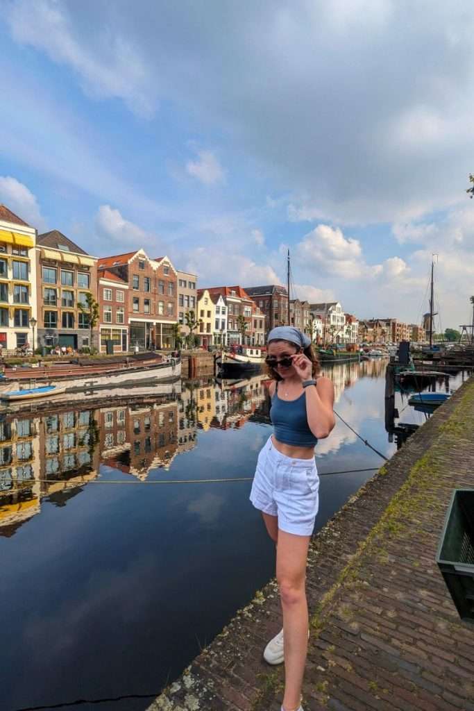 Liz posing along the street of the Historic Delfshaven in Rotterdam