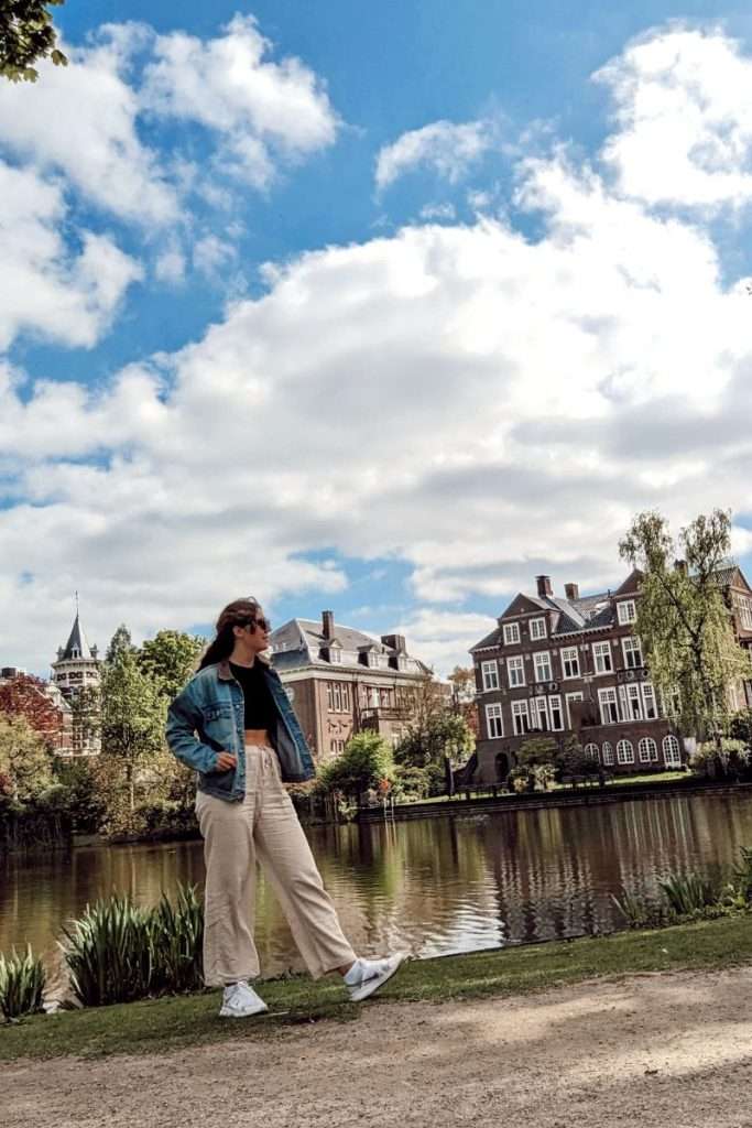 Liz standing in front of dutch houses in Amsterdam