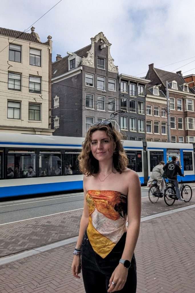 Liz standing in the Netherlands during a 7 day train trip in Amsterdam