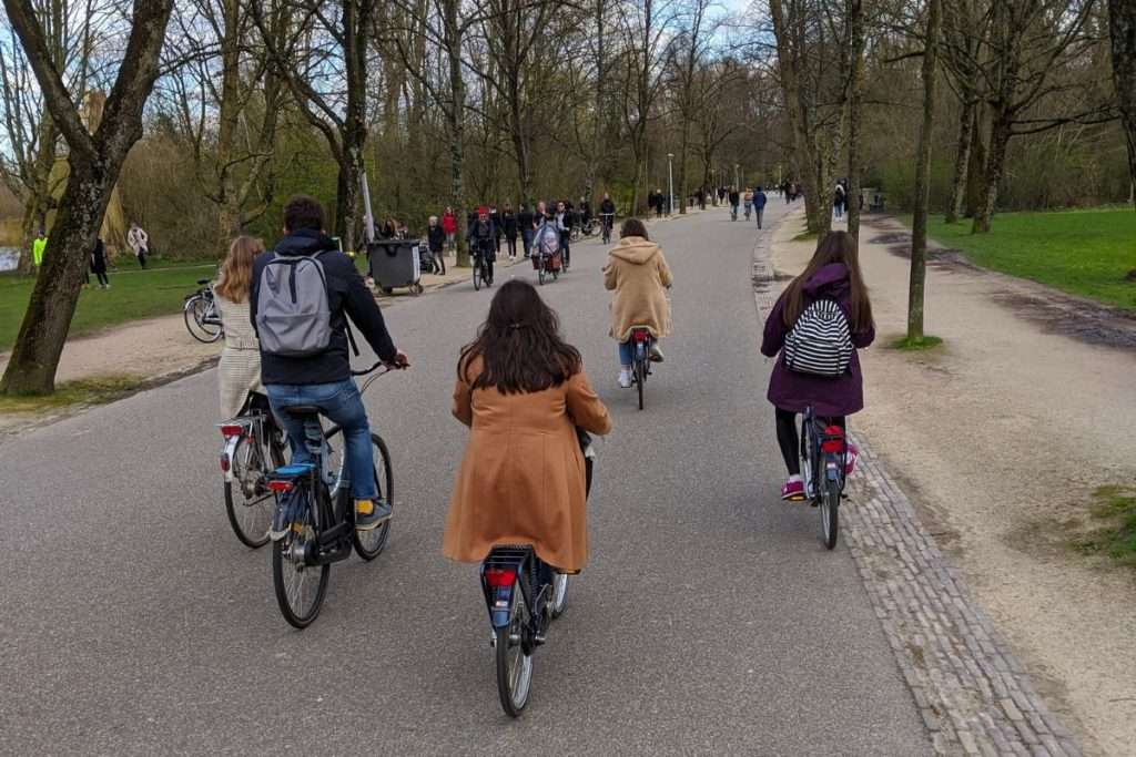 Biking through Vondelpark in Amsterdam with friends.
