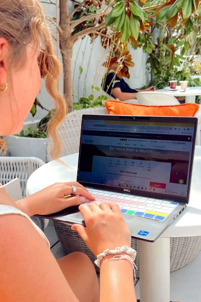 Researching how to work abroad without experience through structured programs like Global Work and Travel