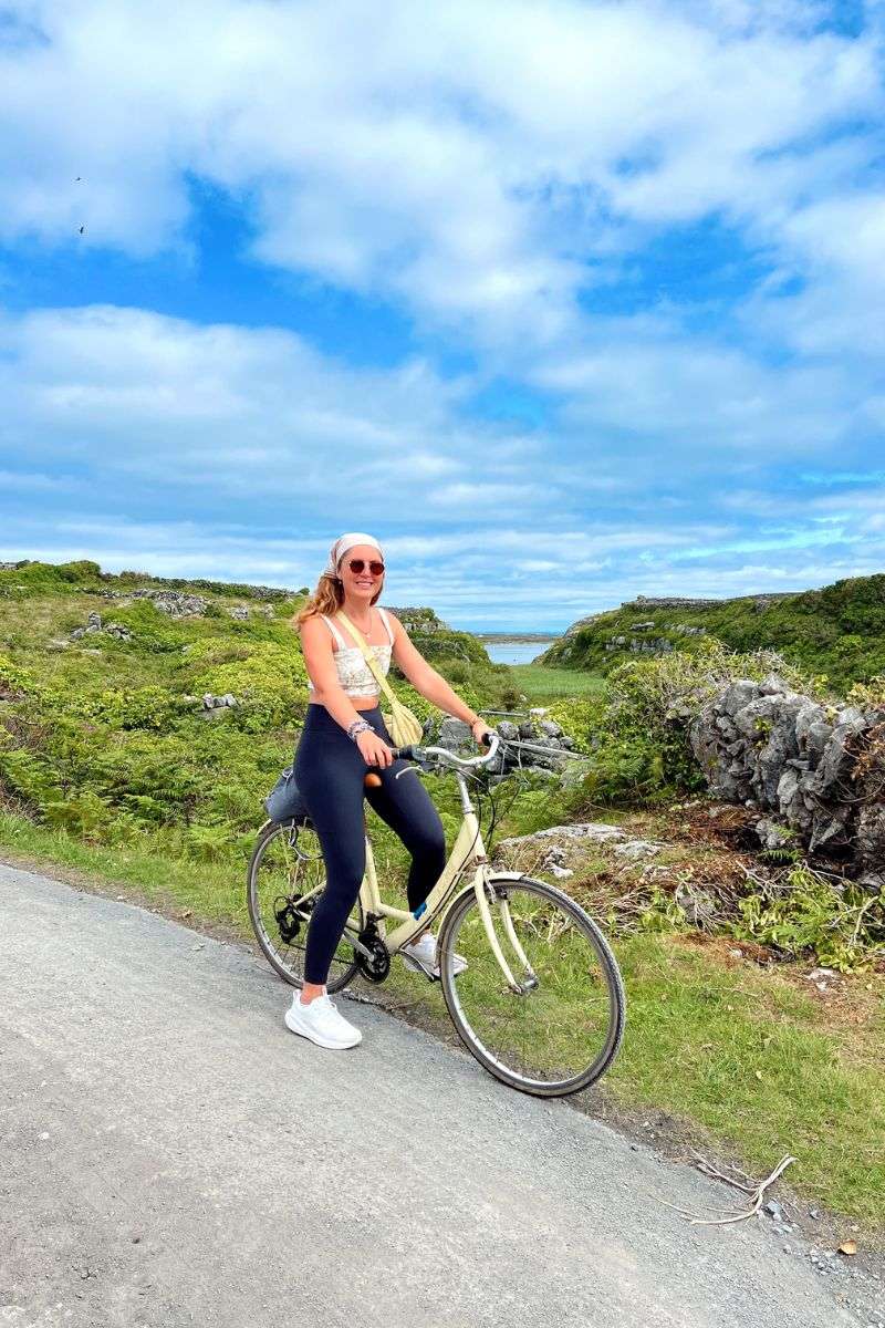 Liz on a bike while riding around the Aran Islands in Ireland.