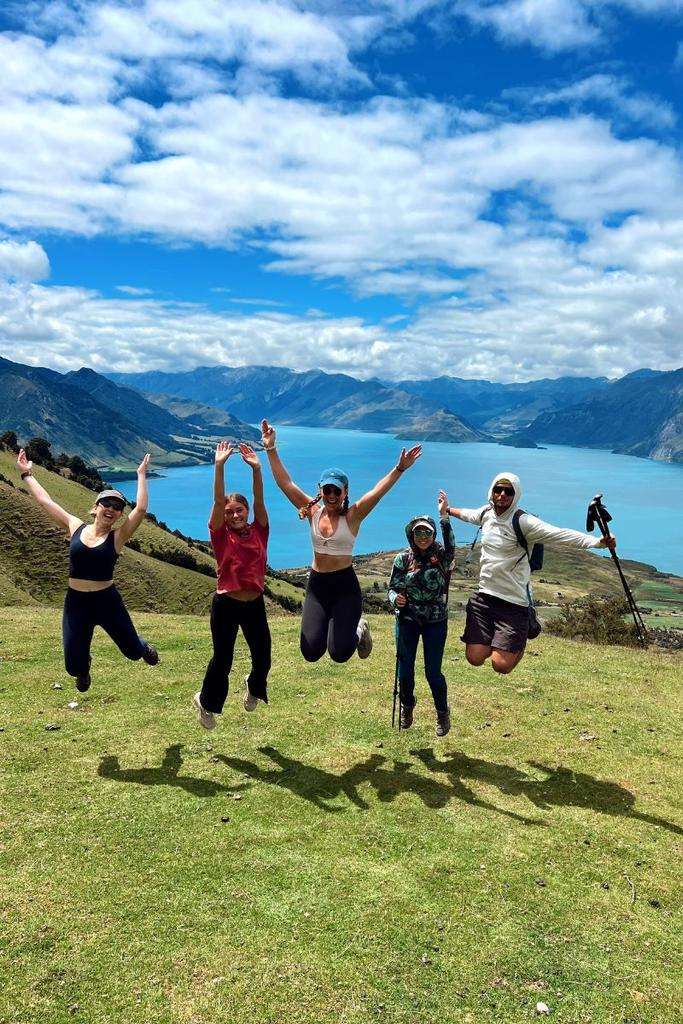 Traveler Liz and friends together in New Zealand on a hike.