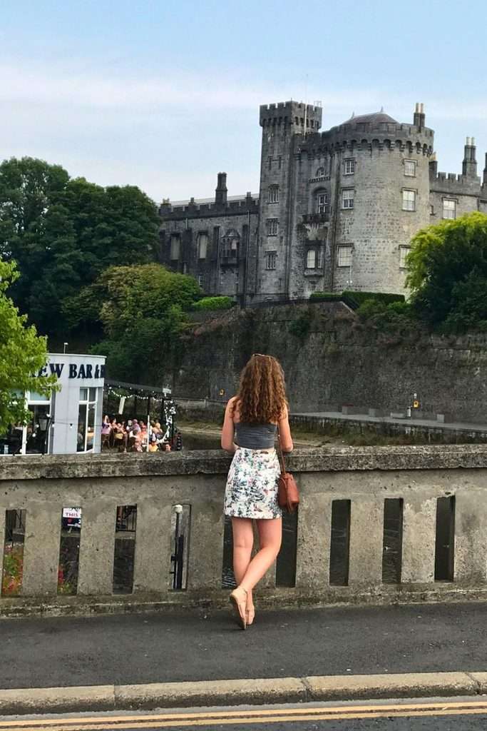 View of Kilkenny Castle from the bridge across the street in Ireland.