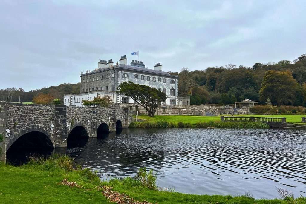 View of the Westport house from behind with the Bay in view.